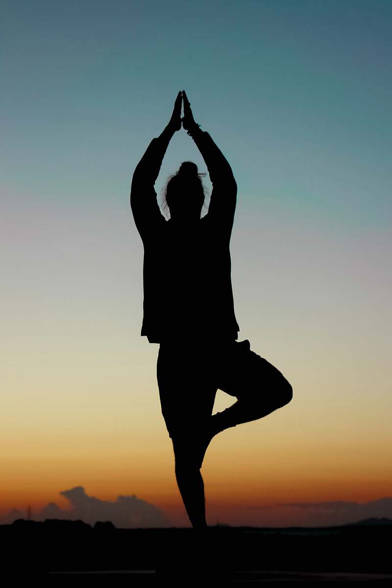 Yoga Silhouette Of Person Performing Yoga Sunset Image Free Photo