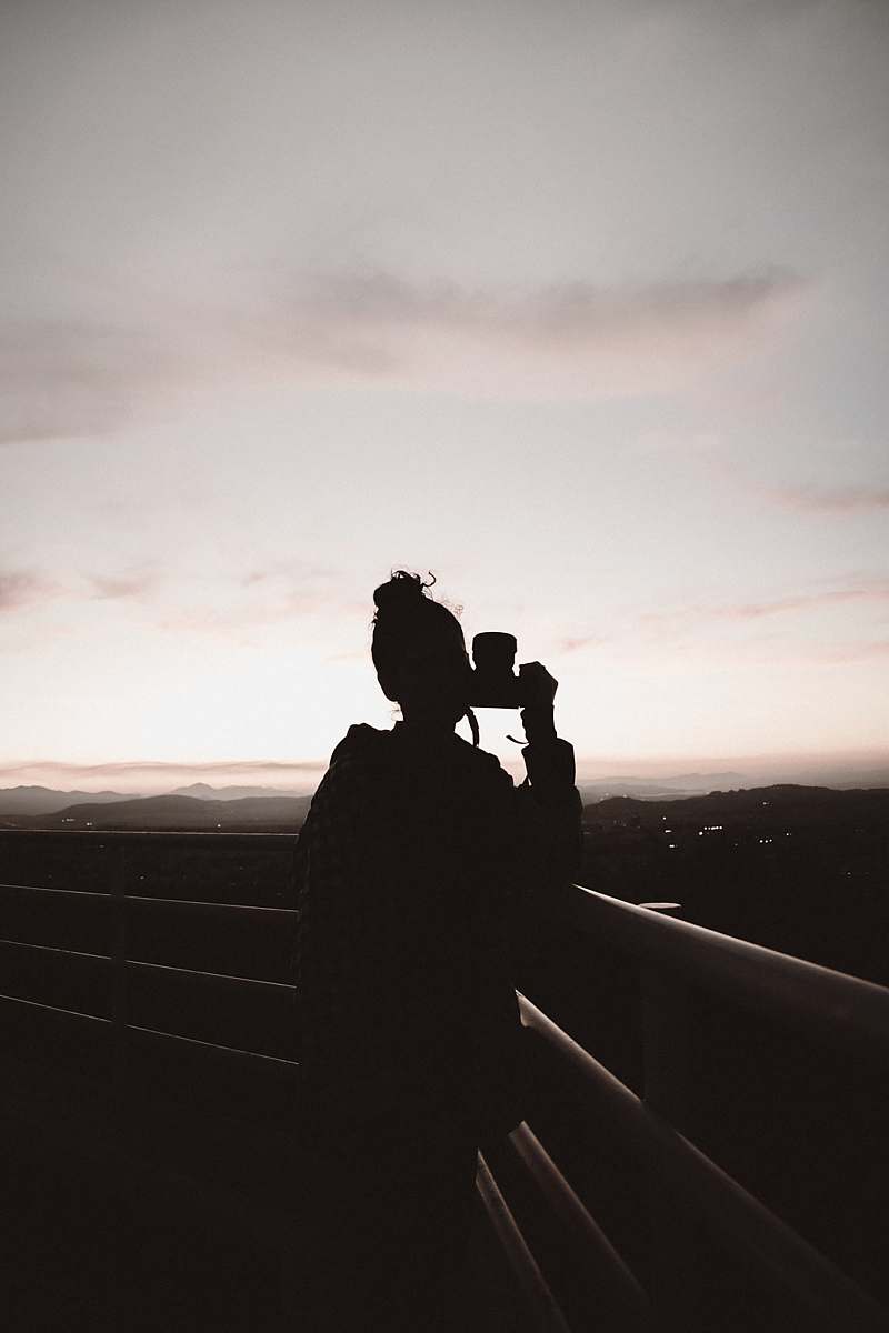 athens silhouette of person standing and holding camera greece