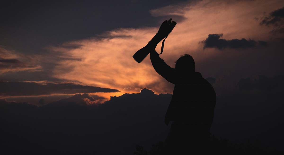 mexico silhouette of person under cloudy skies during sunset dramatic sky