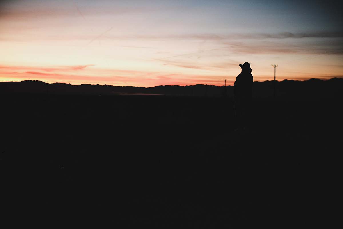 nature silhouette of person walking on street outdoors