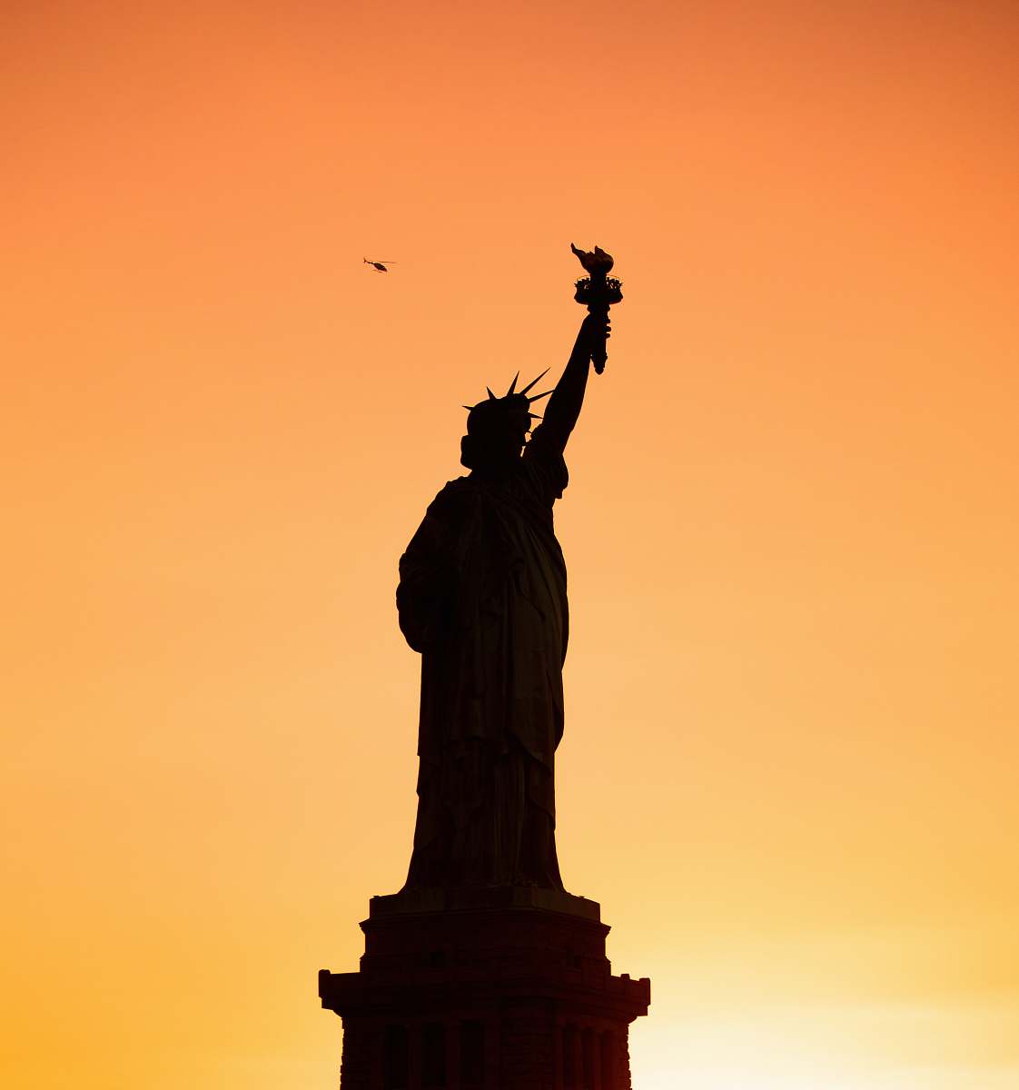 monument silhouette of statue of liberty new york