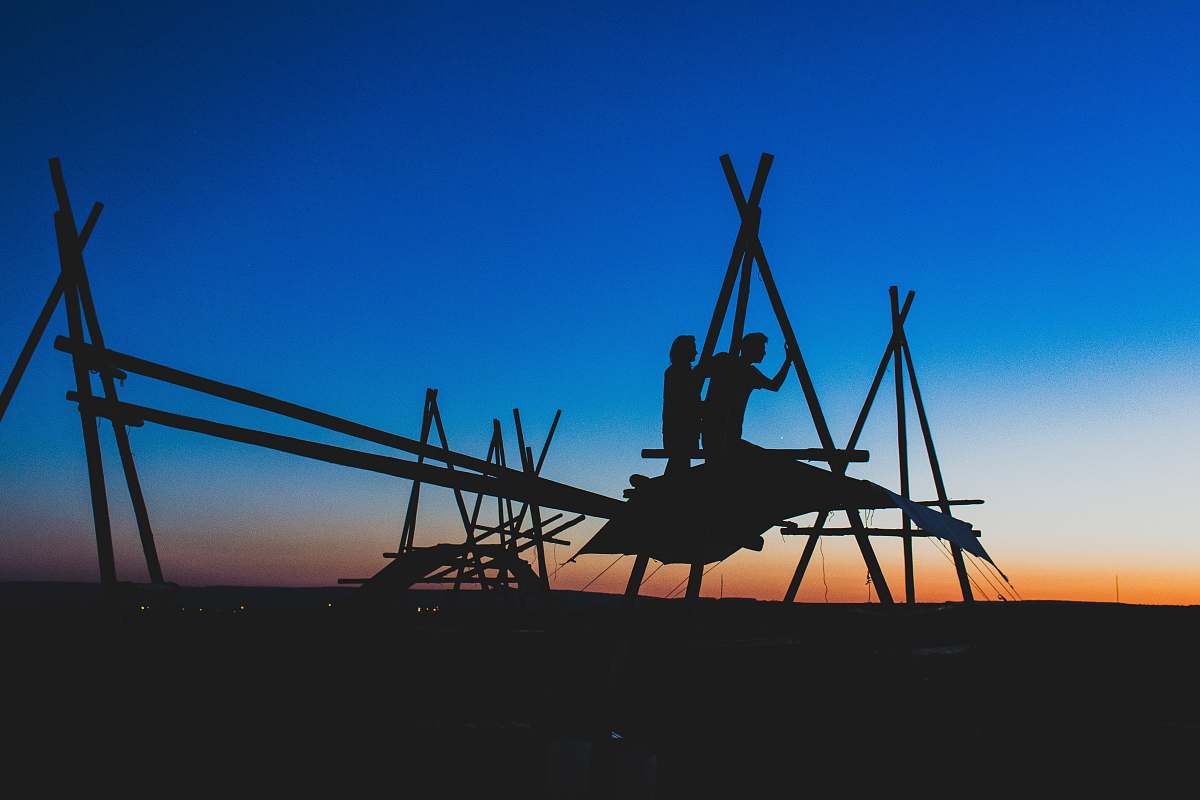 outdoors silhouette of two persons sky