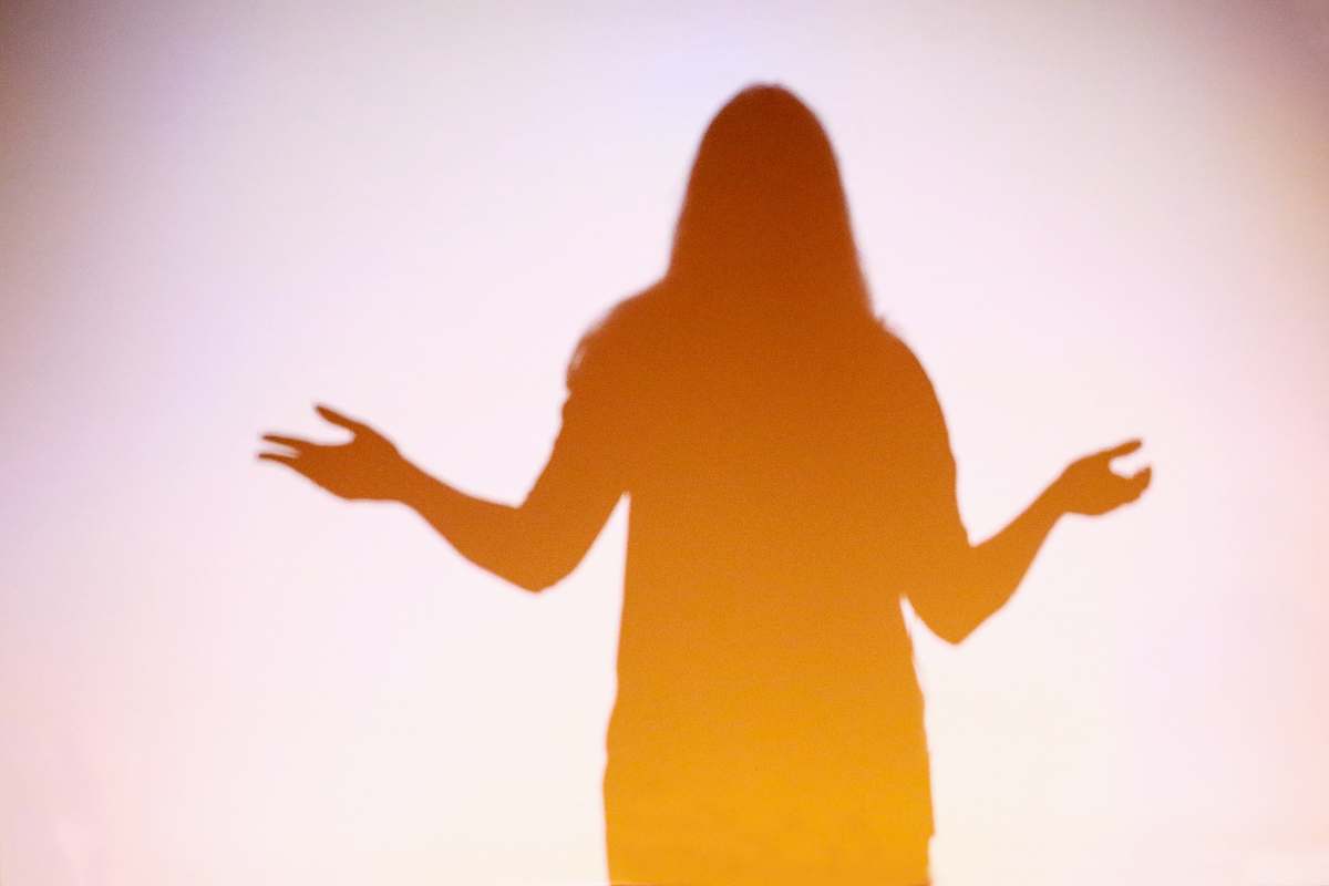 flare silhouette of woman light