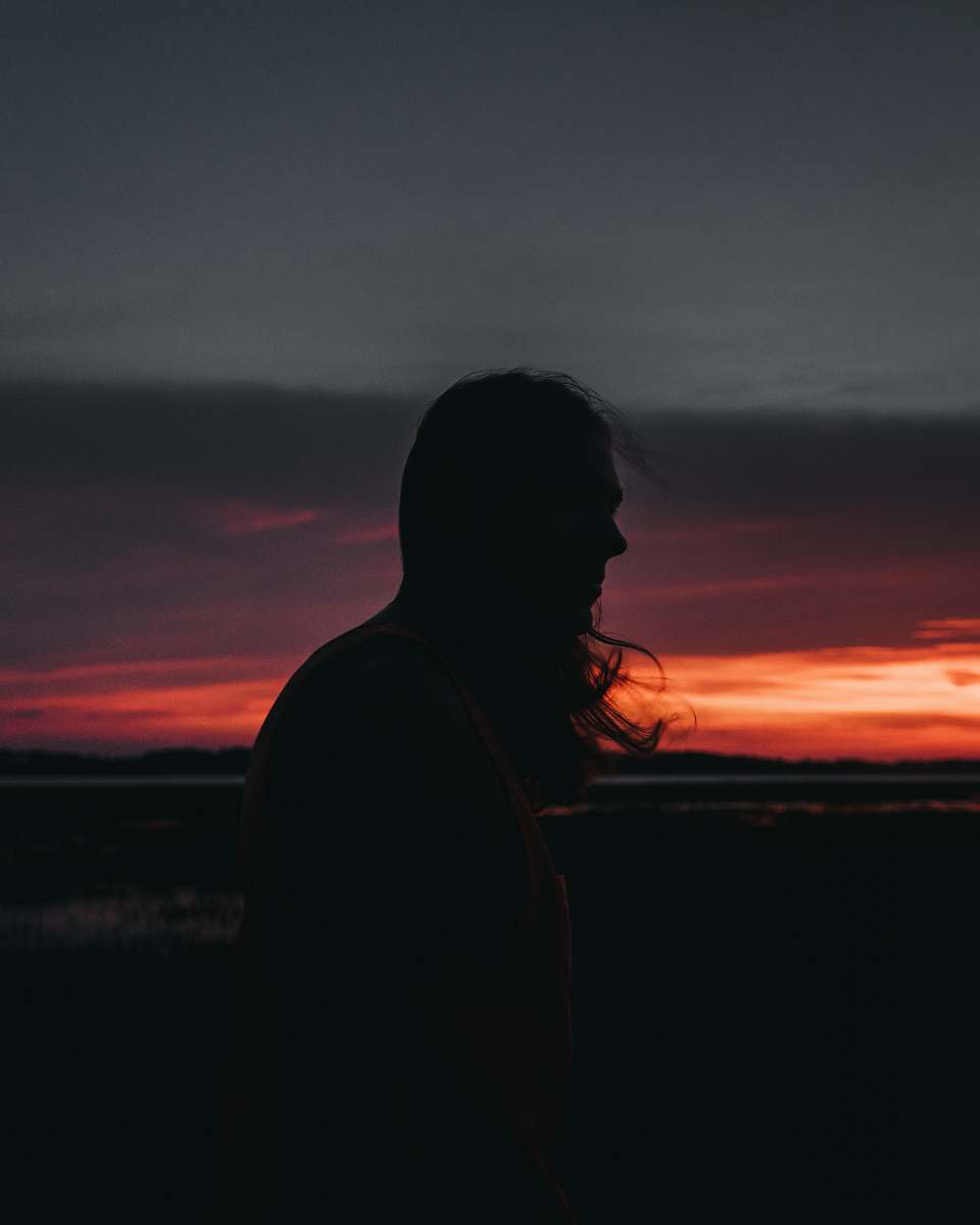 nature silhouette of woman near mountain outdoors