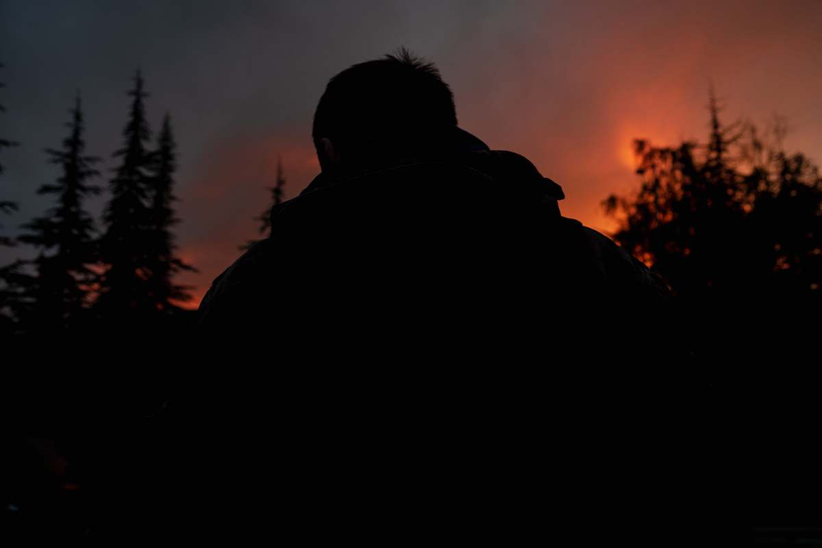 nature silhouette photo of man and trees outdoors