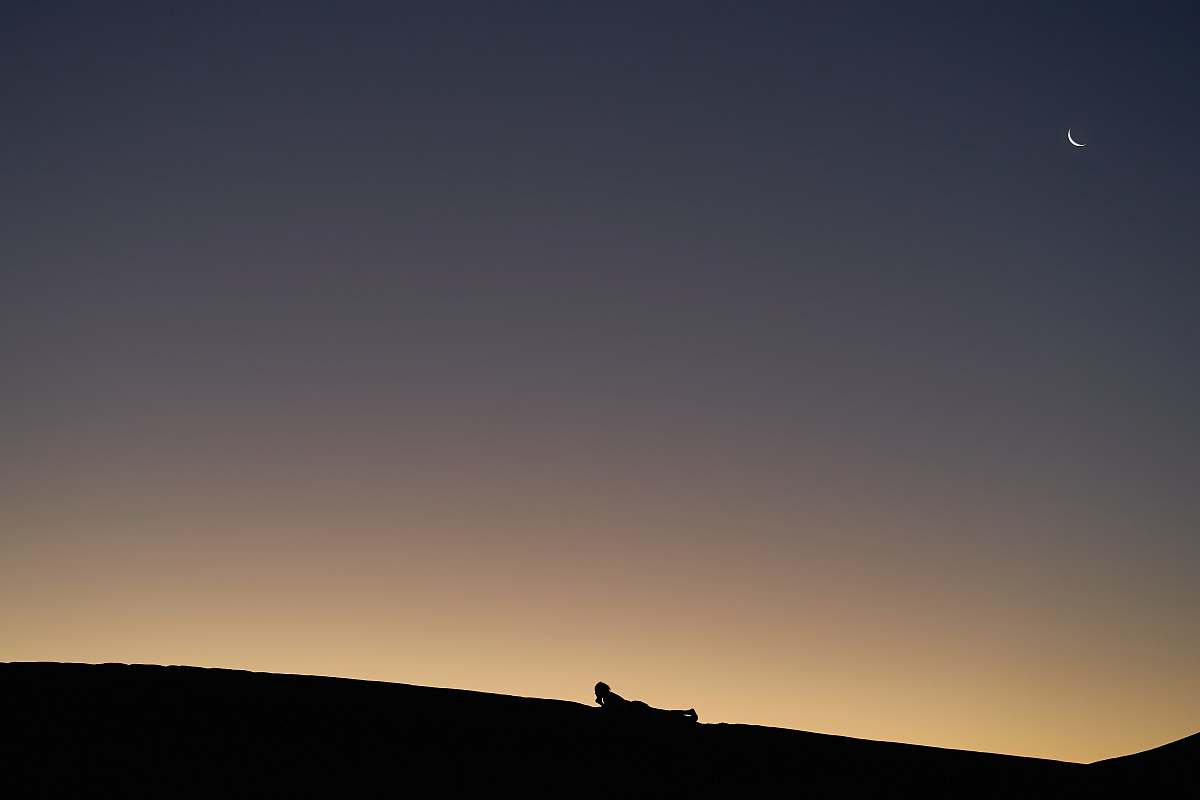 nature silhouette photo of mountains and moon outdoors