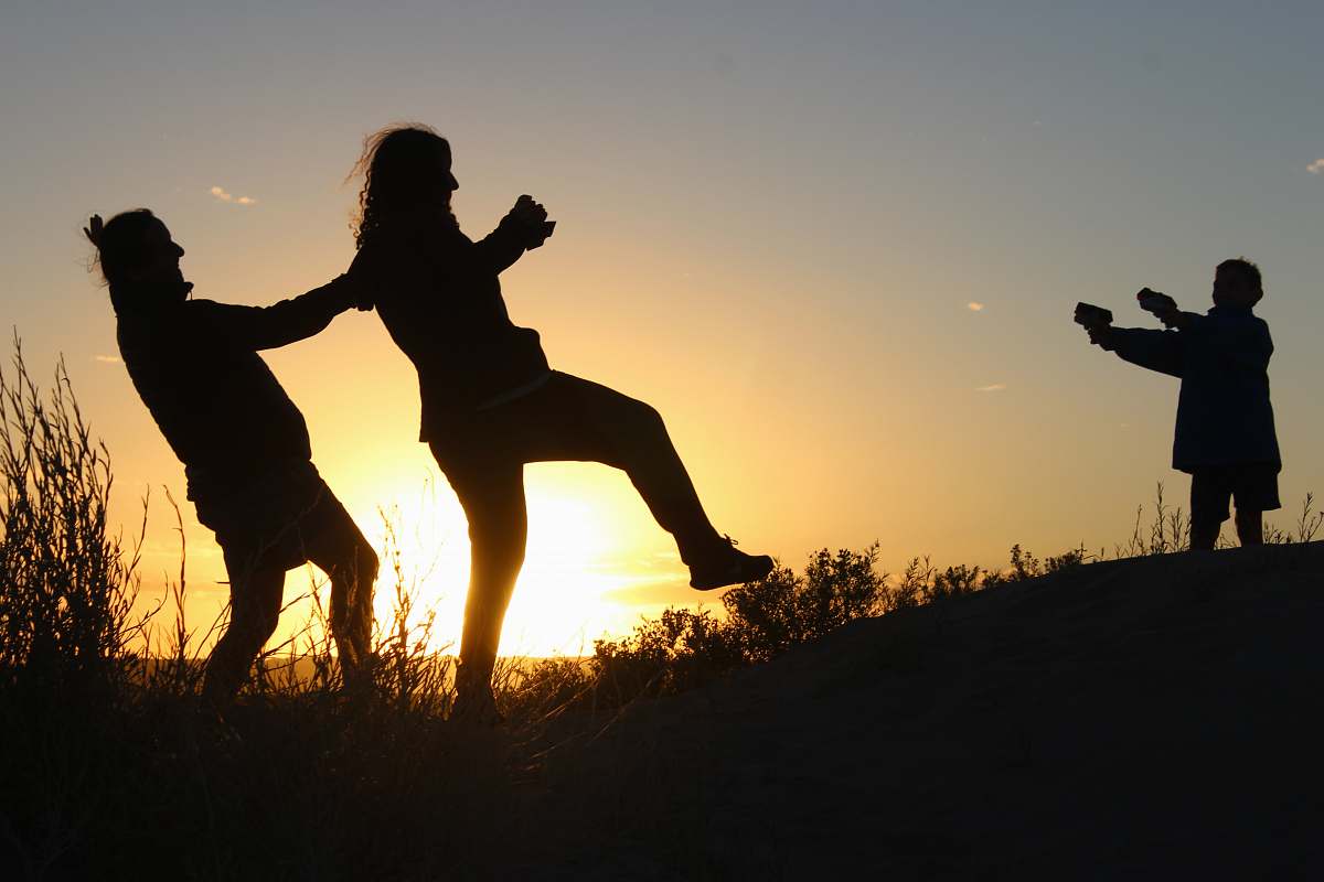 human silhouette photo of three person person