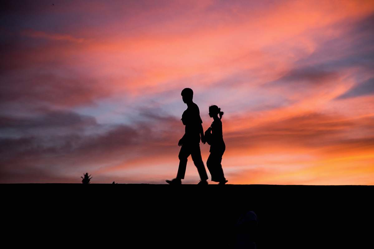 human silhouette photography of man and woman people
