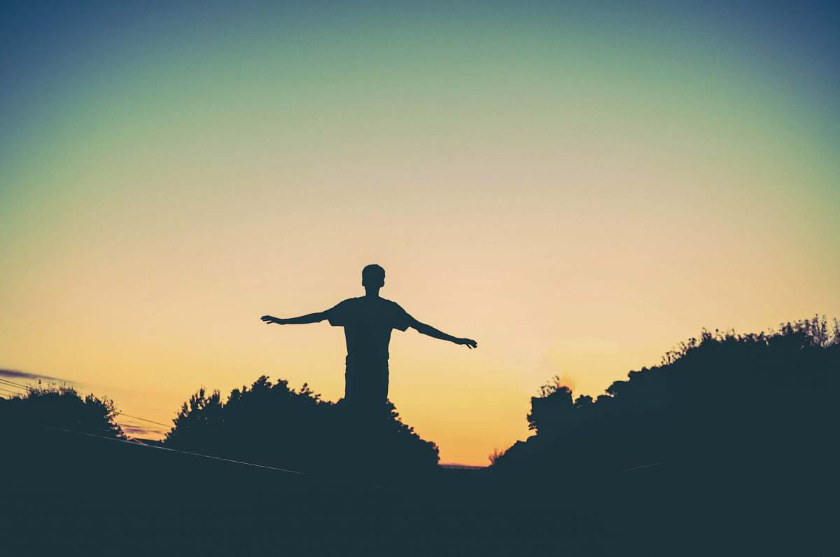 wayzata silhouette photography of man raising arms united states