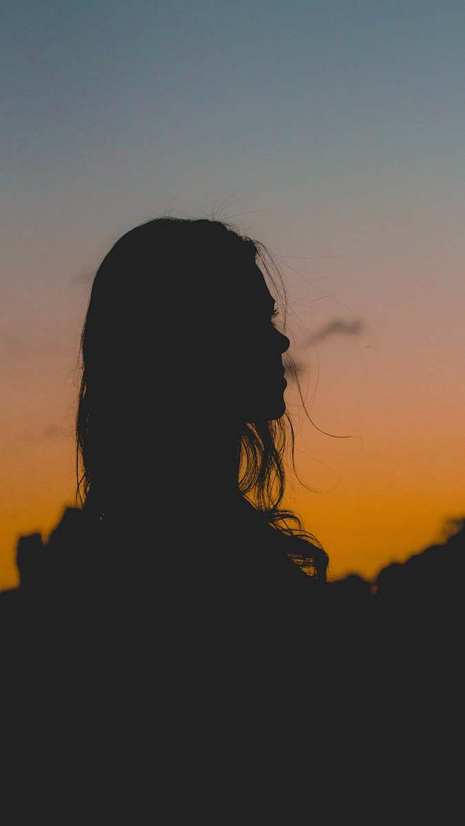 nature silhouette photography of woman outdoors