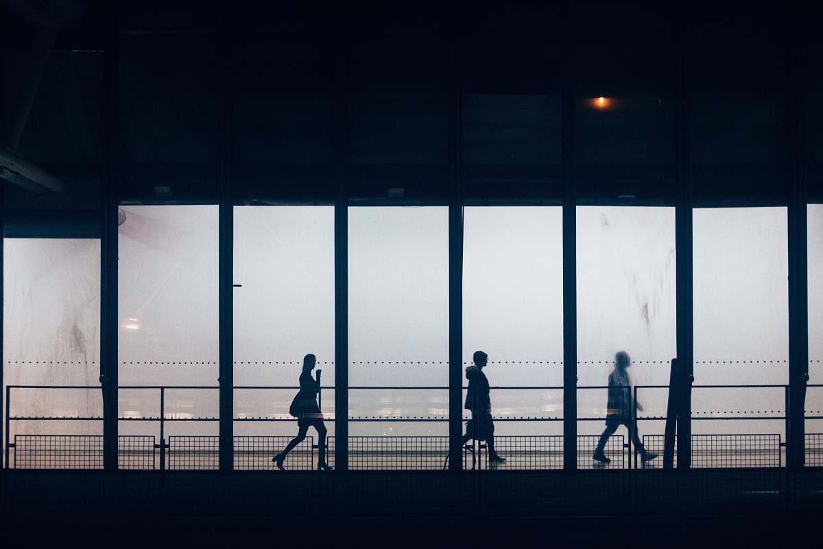 human silhouette photography unknown persons walking person