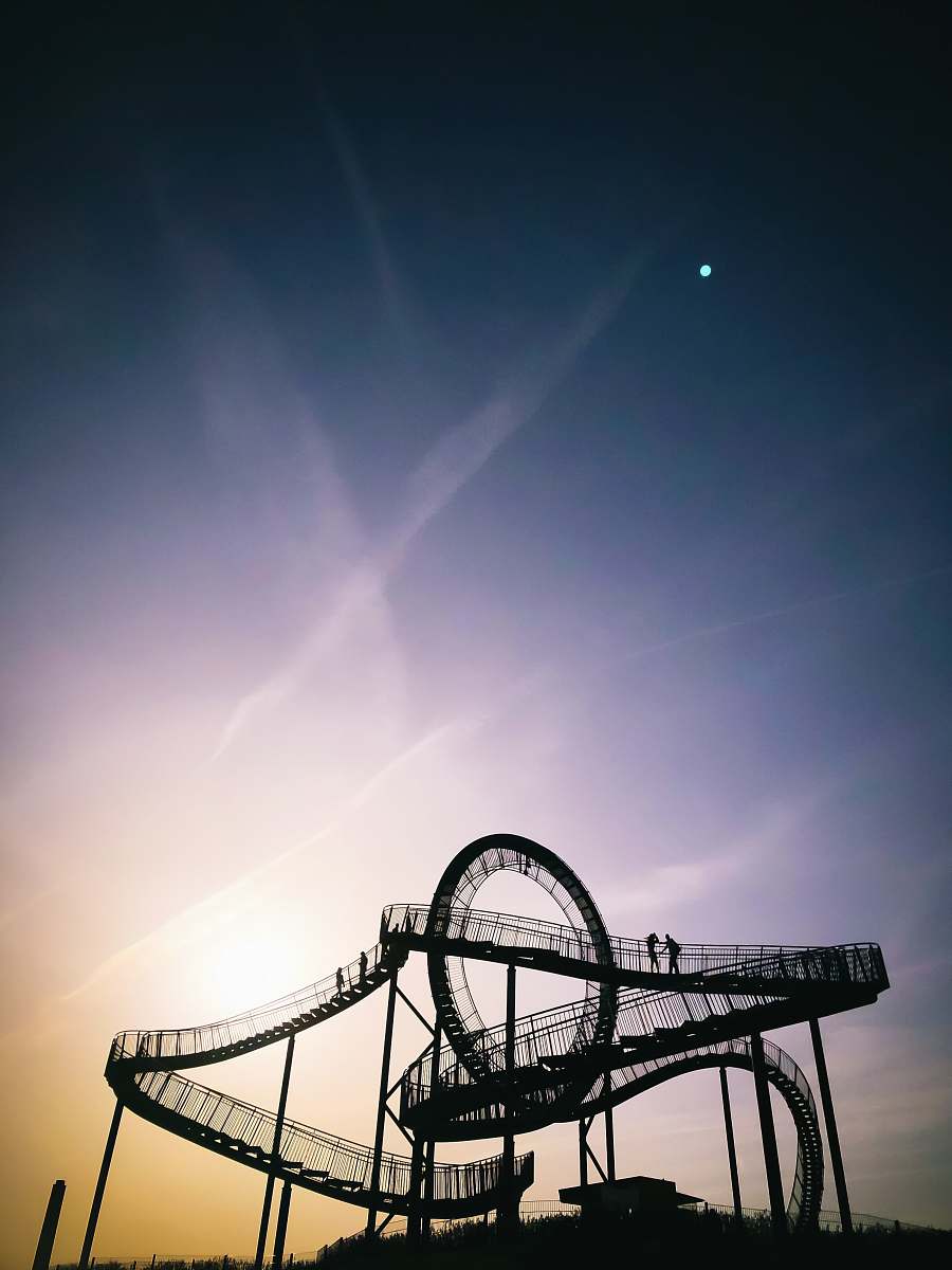 duisburg two person on top of roller coaster germany