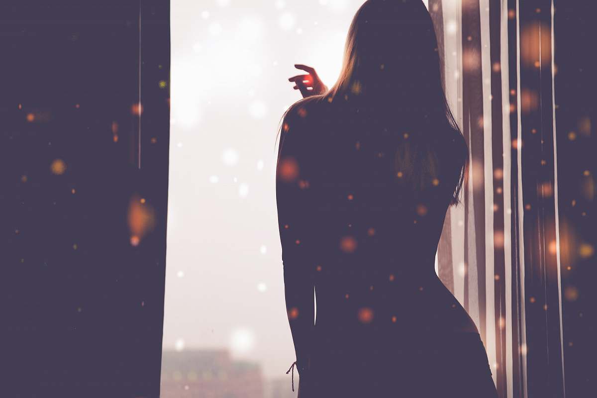person woman holding glass brown