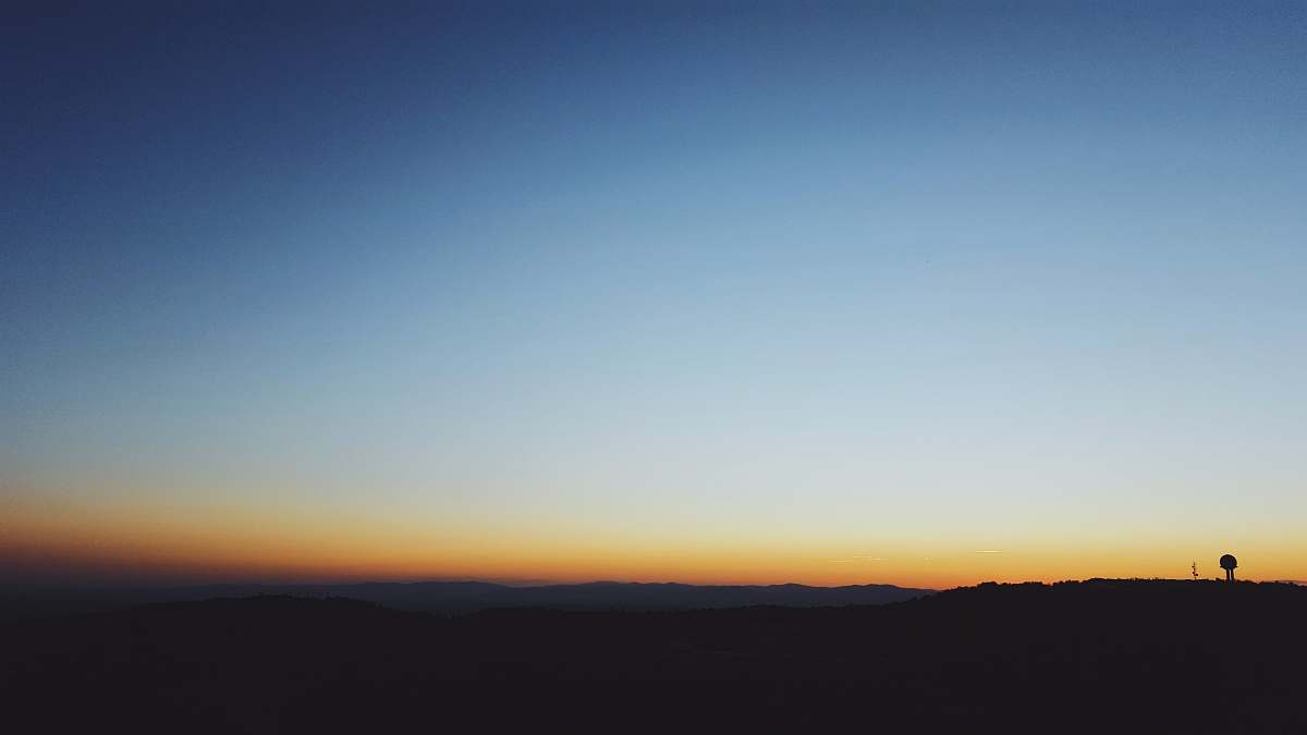 sunrise blue and brown ombre sky on horizon panoramic photo landscape