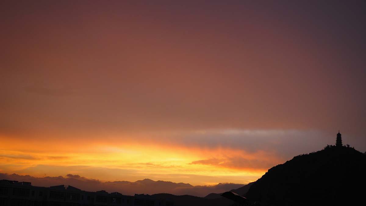 sunrise golden hour photography of hills sunset