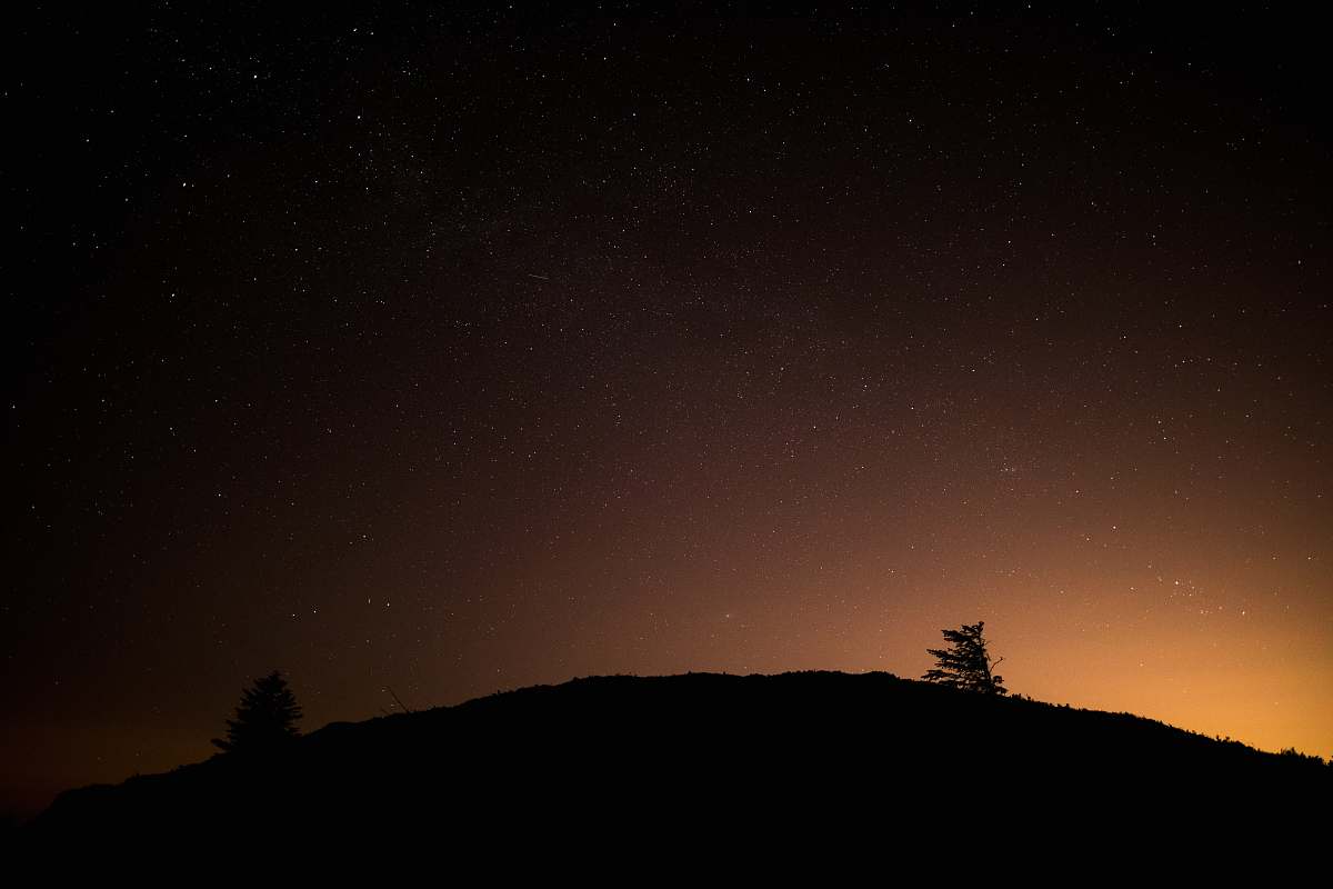 night mountain silhouette during night time ireland