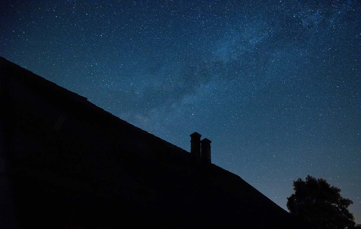 grey silhouette photography of roof house night