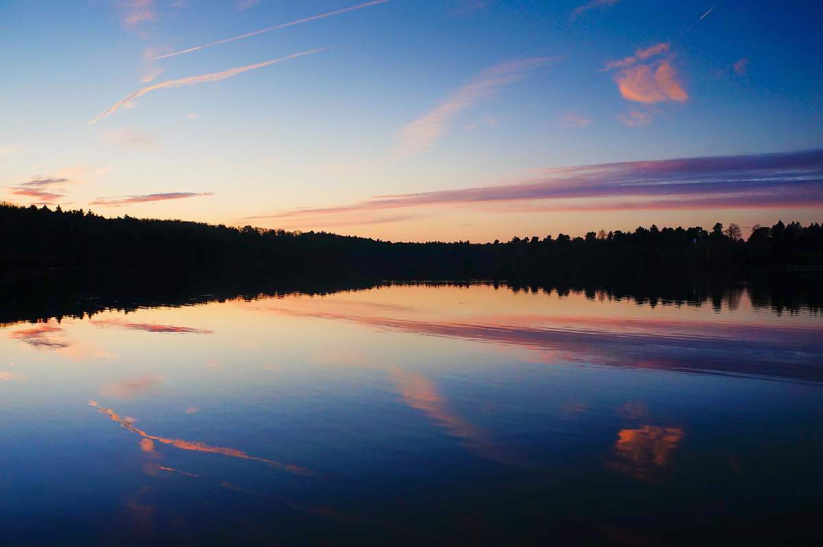 sunrise lake under blue sky dawn