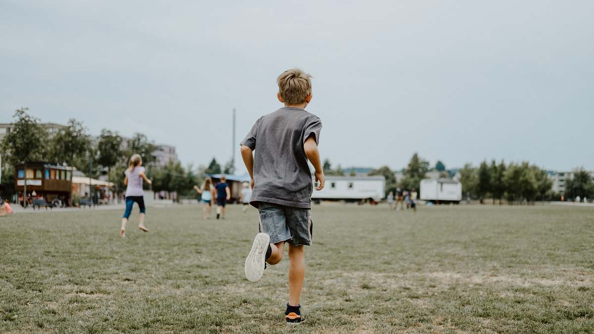 people boy running on lawn person