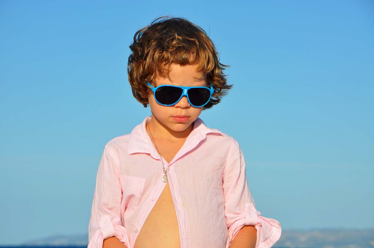 person child facing down during daytime people
