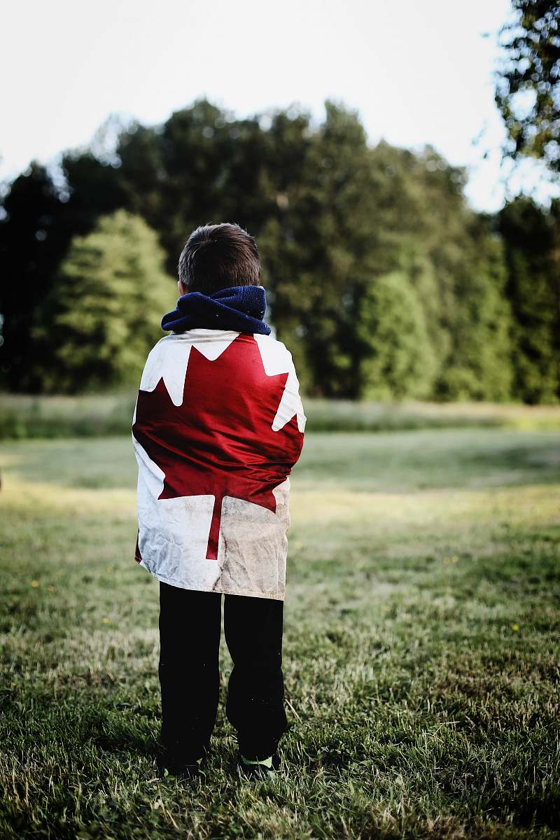 person child wearing Canada flag people