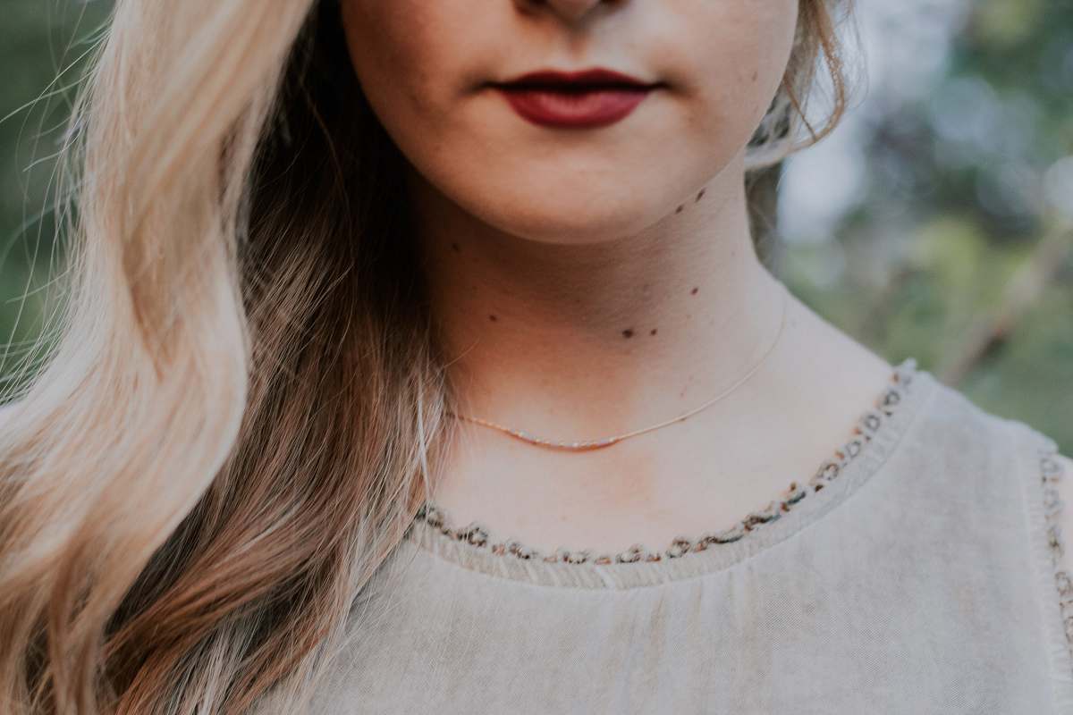 people closeup photography of woman in gray shirt person