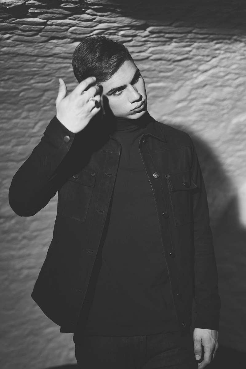people grayscale photo of man dress shirt black-and-white
