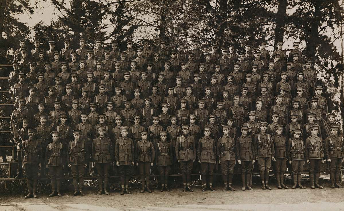 person grayscale photography of army group picture army