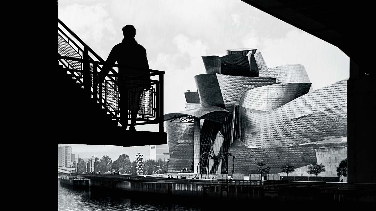 people grayscale photography of person standing on staircase person