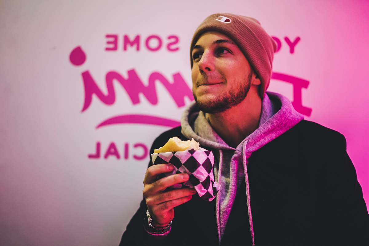 people man eating burger person