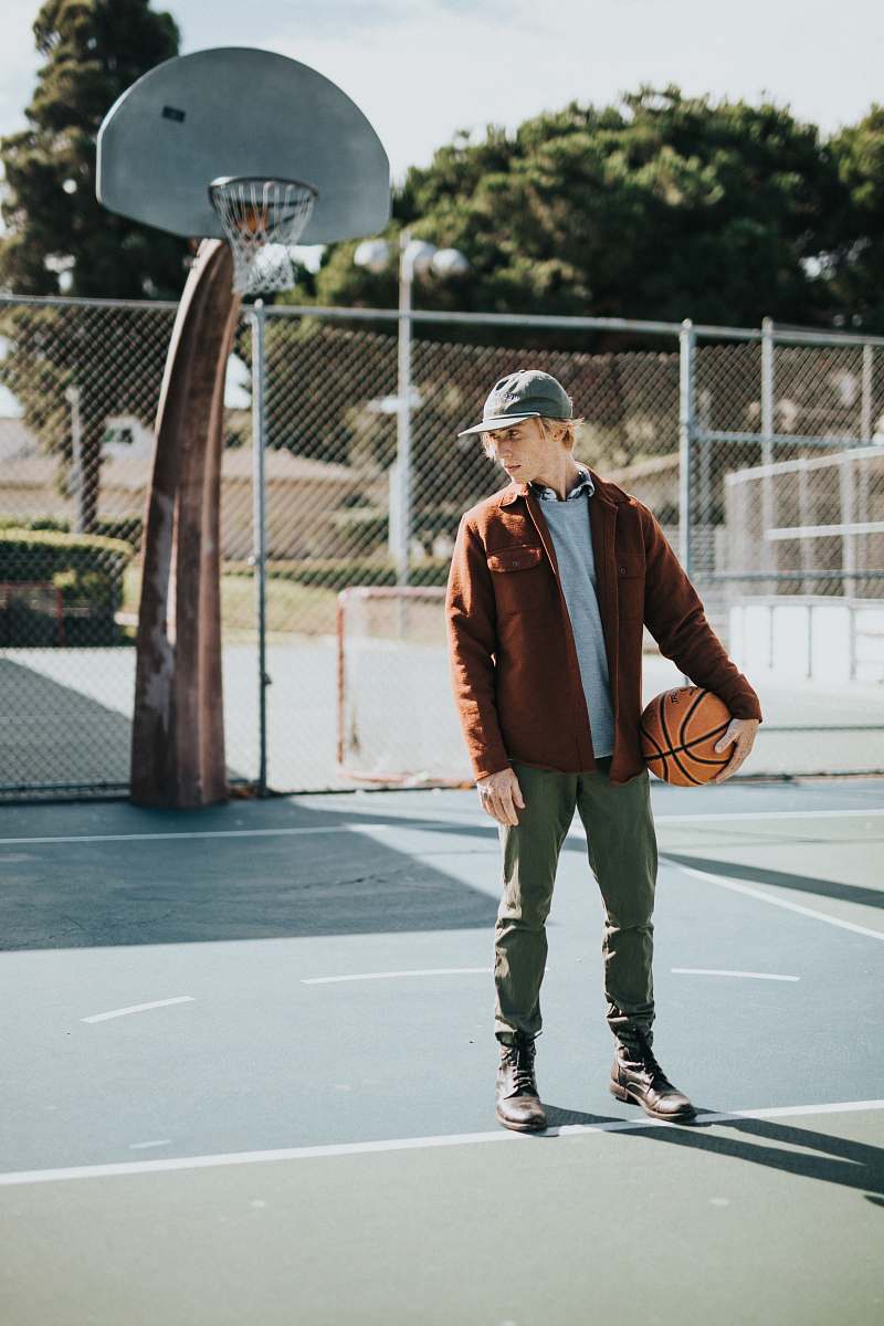 people man holding basketball person