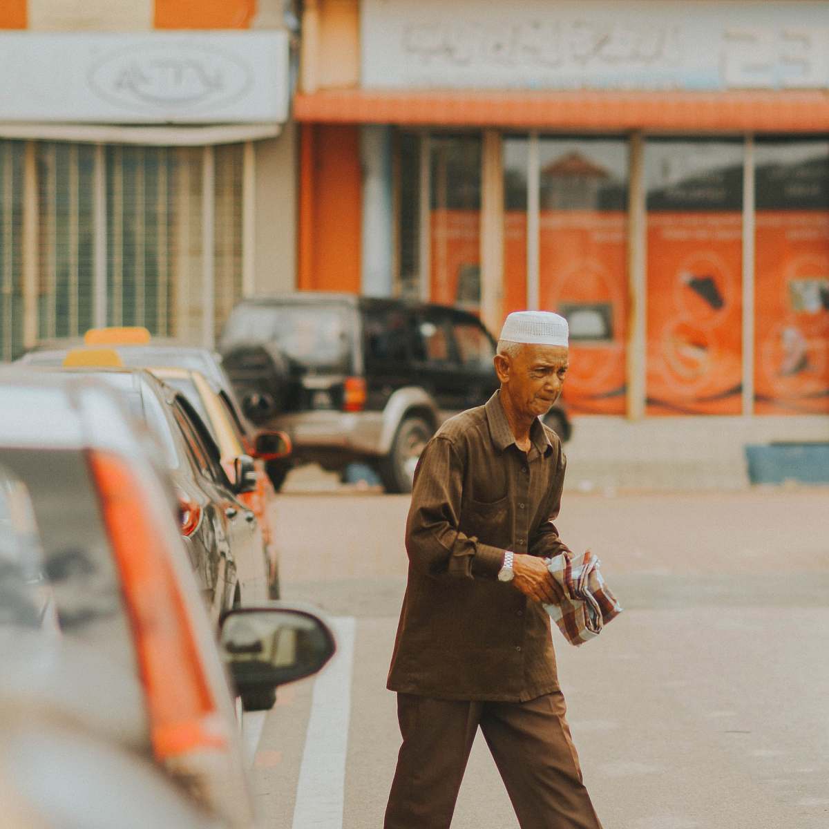 people man holding news paper on street person
