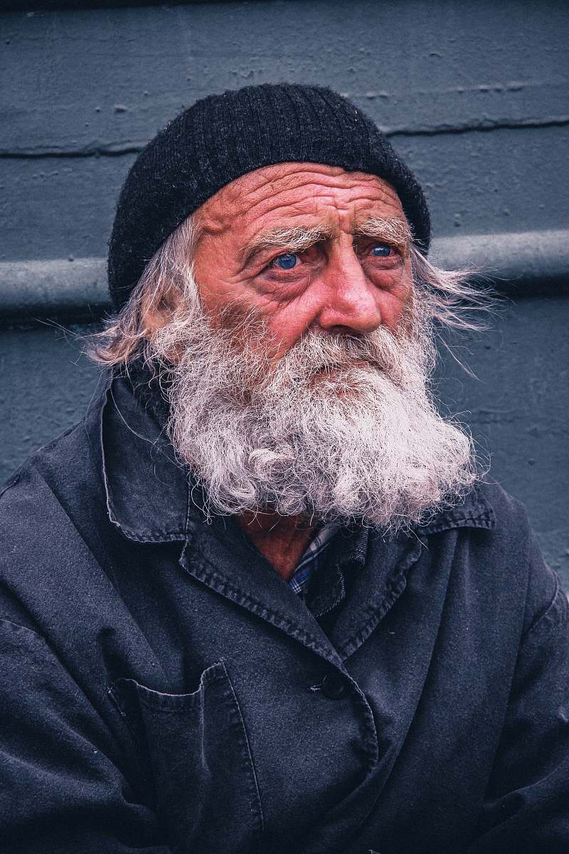 people man in black beanie hat and black button-up jacket person