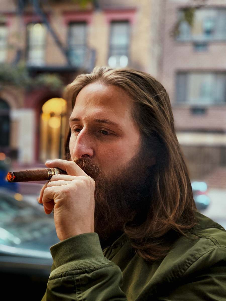 people man smoking cigar person