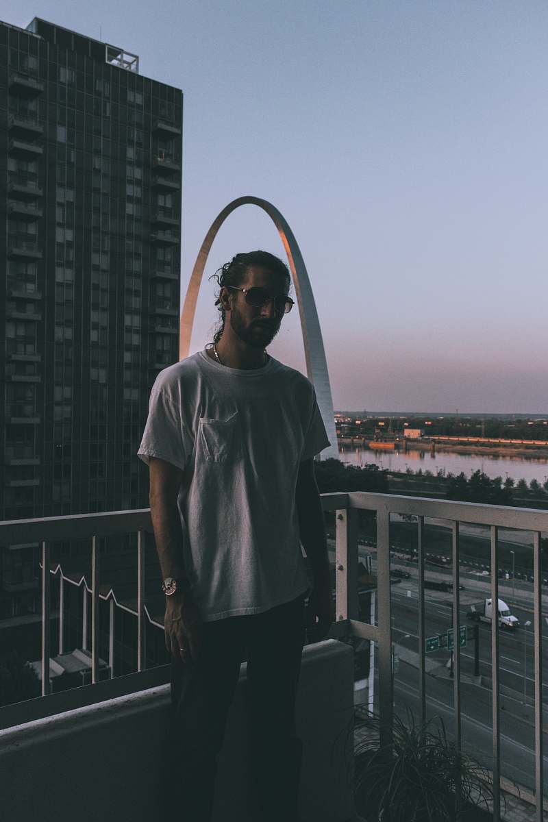 people man standing behind handrails person