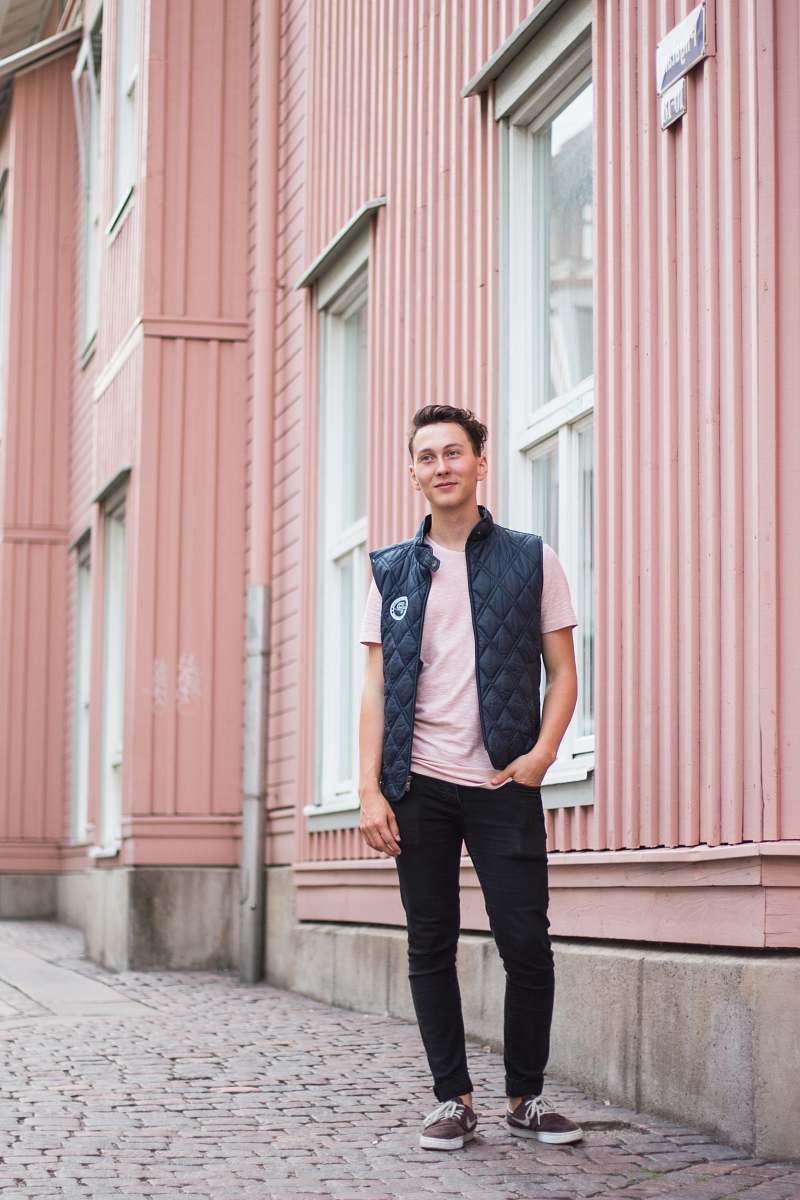 people man standing beside building during day person
