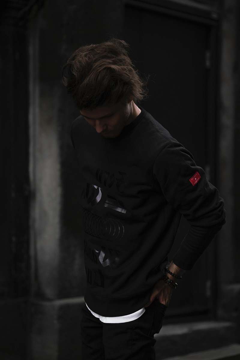 person man standing gray concrete wall people