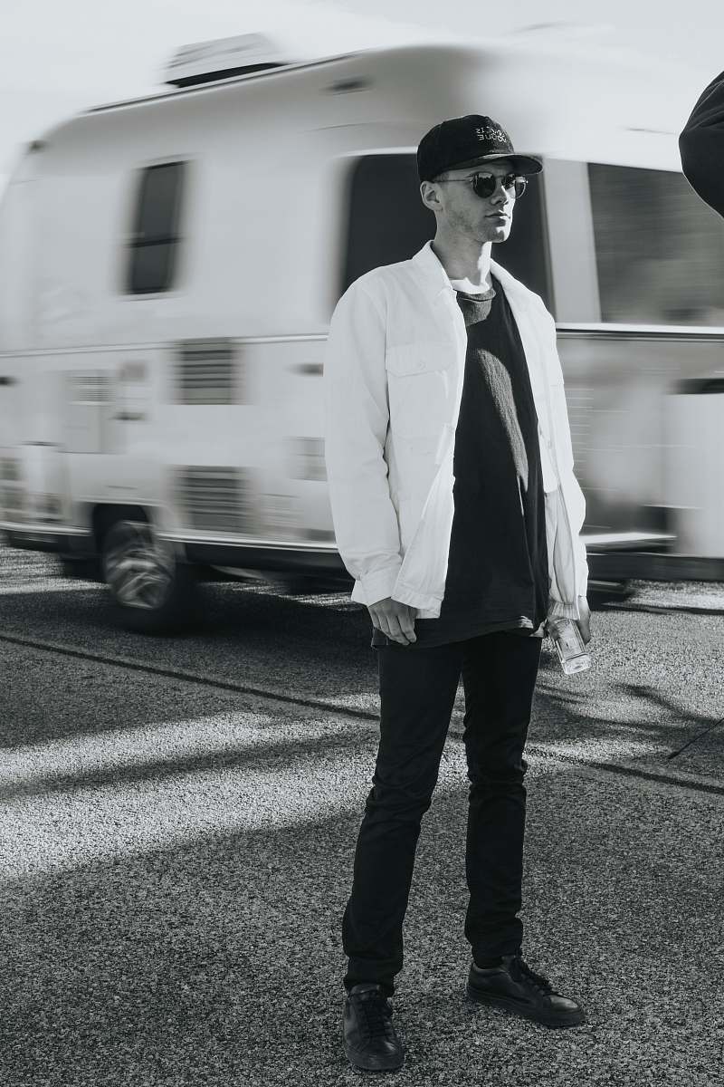 people man standing near vehicle person
