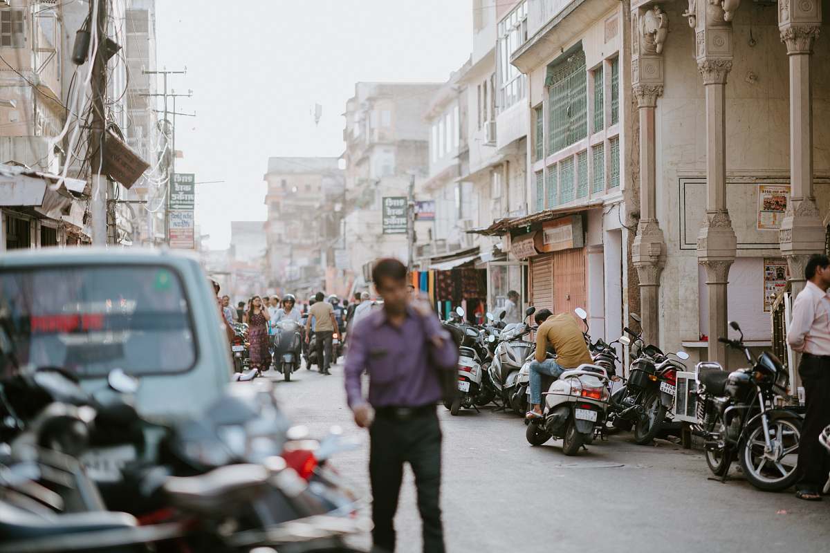 person man standing near vehicle people