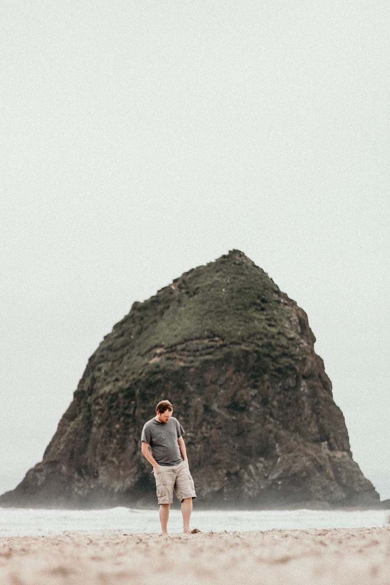 people man standing on beach person