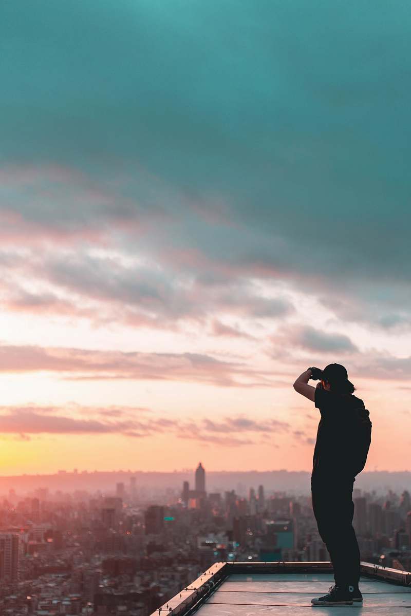 people man standing on concrete building person