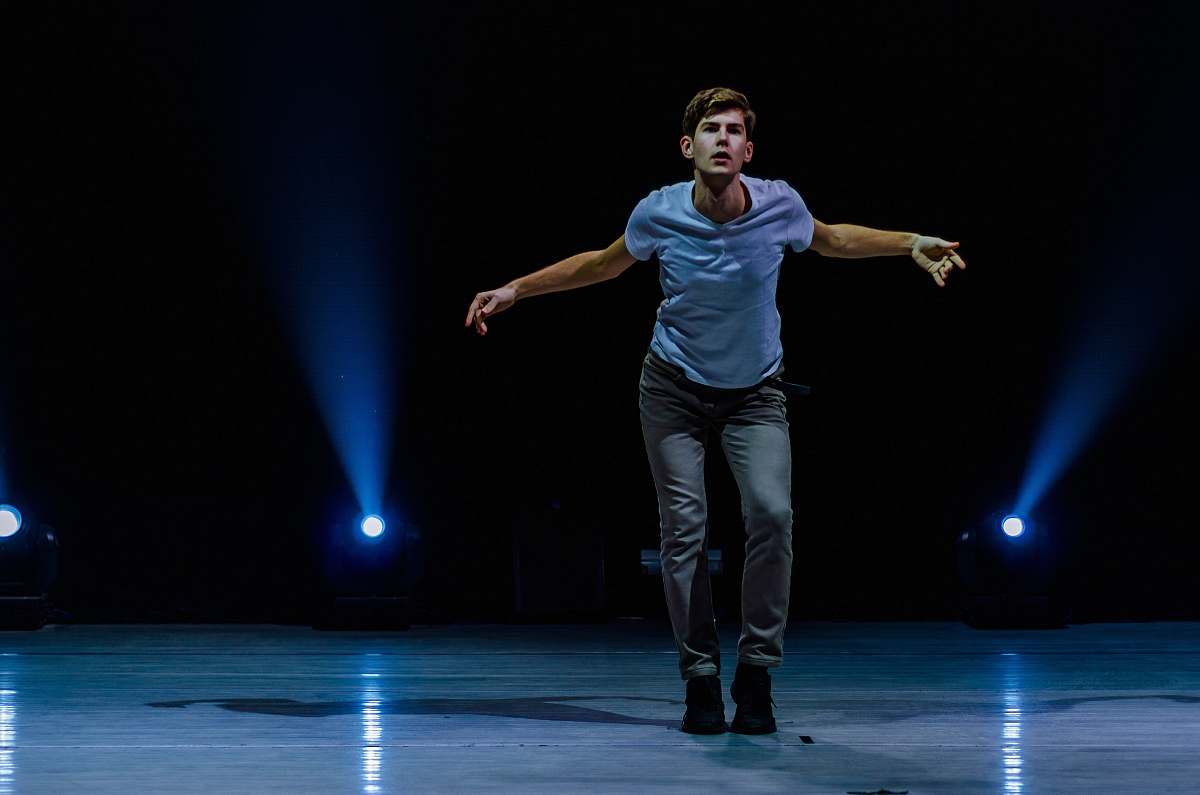 people man standing on stage person