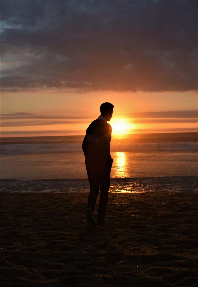 people man walking seashore beach