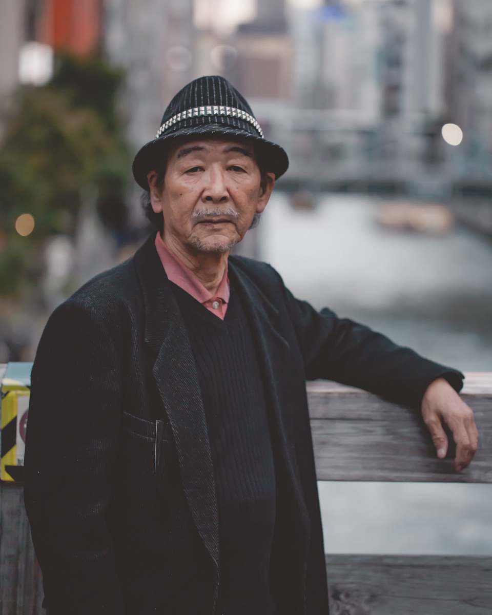 People Man Wearing Black Hat Standing Against Wooden Handrail Person ...