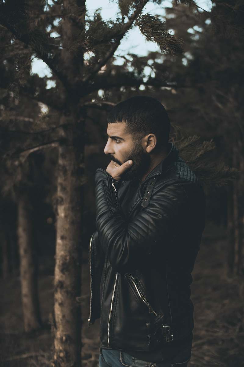 people man wearing black leather jacket person