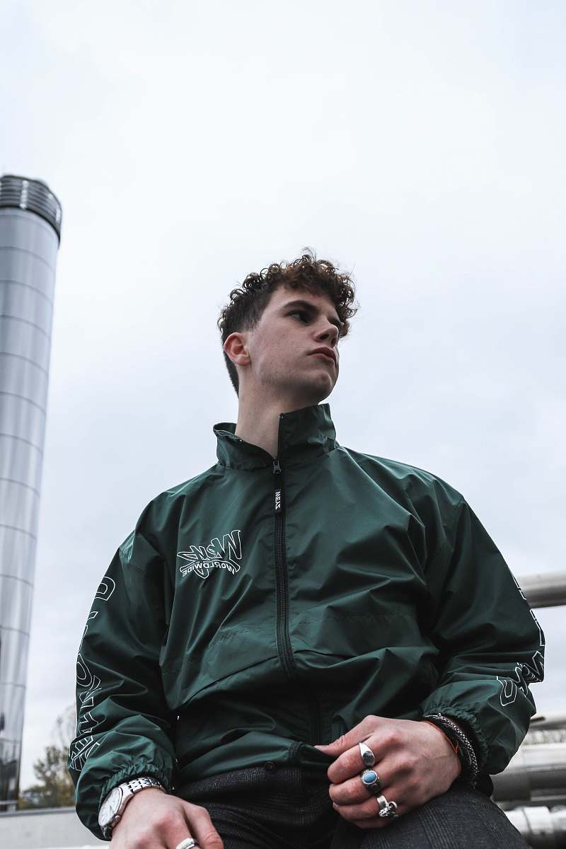 people man wearing black zip-up jacket person