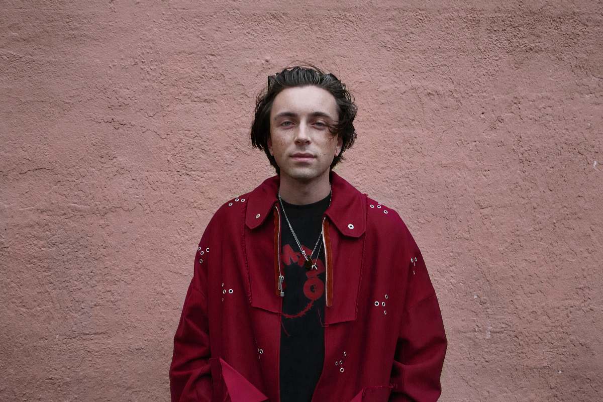 person man wearing red coat people