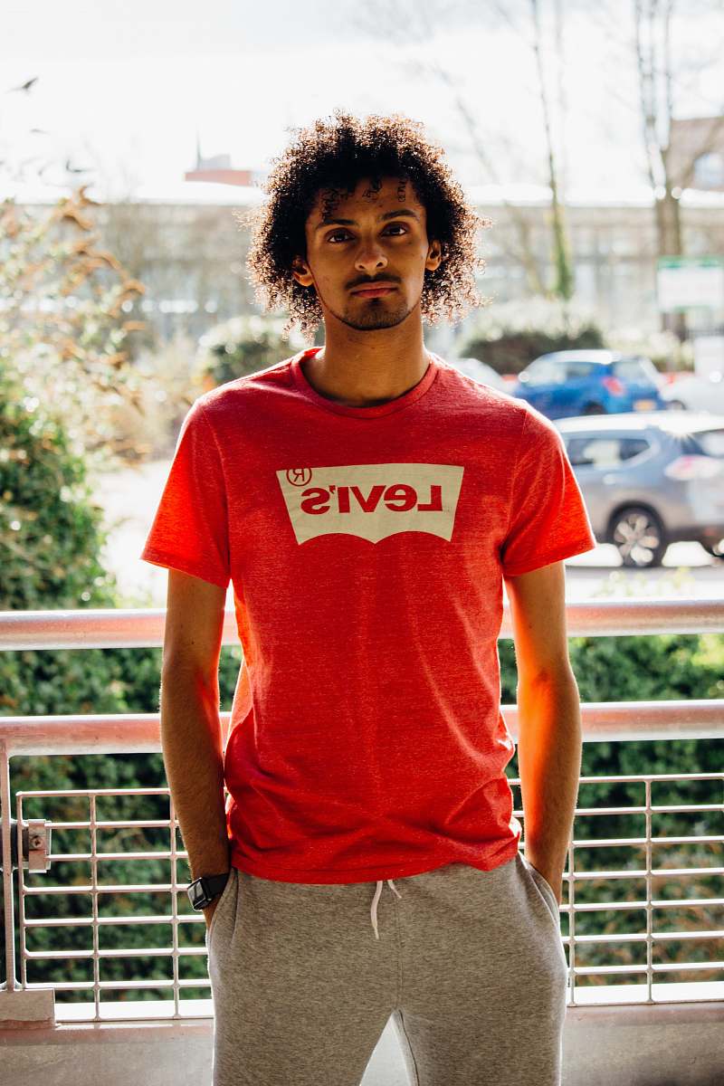 people man wearing red Levi's T-shirt person