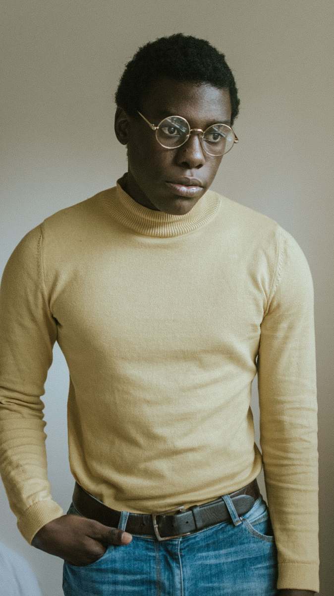 people man wearing yellow sweater person