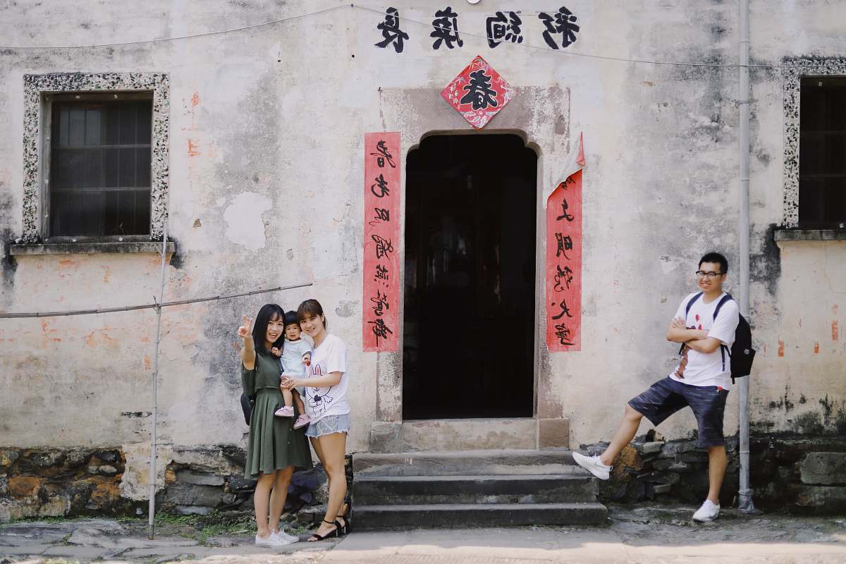 people people standing near concrete building person